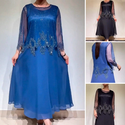 Κομψό μονόχρωμο φόρεμα με διαφανές στρώμα που λάμπει