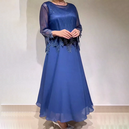 Κομψό μονόχρωμο φόρεμα με διαφανές στρώμα που λάμπει