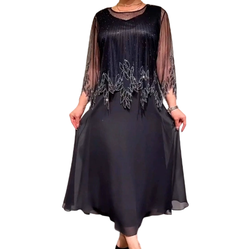 Κομψό μονόχρωμο φόρεμα με διαφανές στρώμα που λάμπει